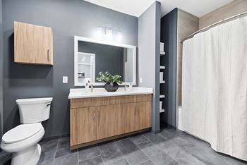 Shaker cabinetry and tile flooring - Stonehill at West Orange